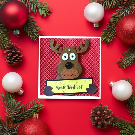 Braille Christmas Greeting Card – "Playful Reindeer with sign"