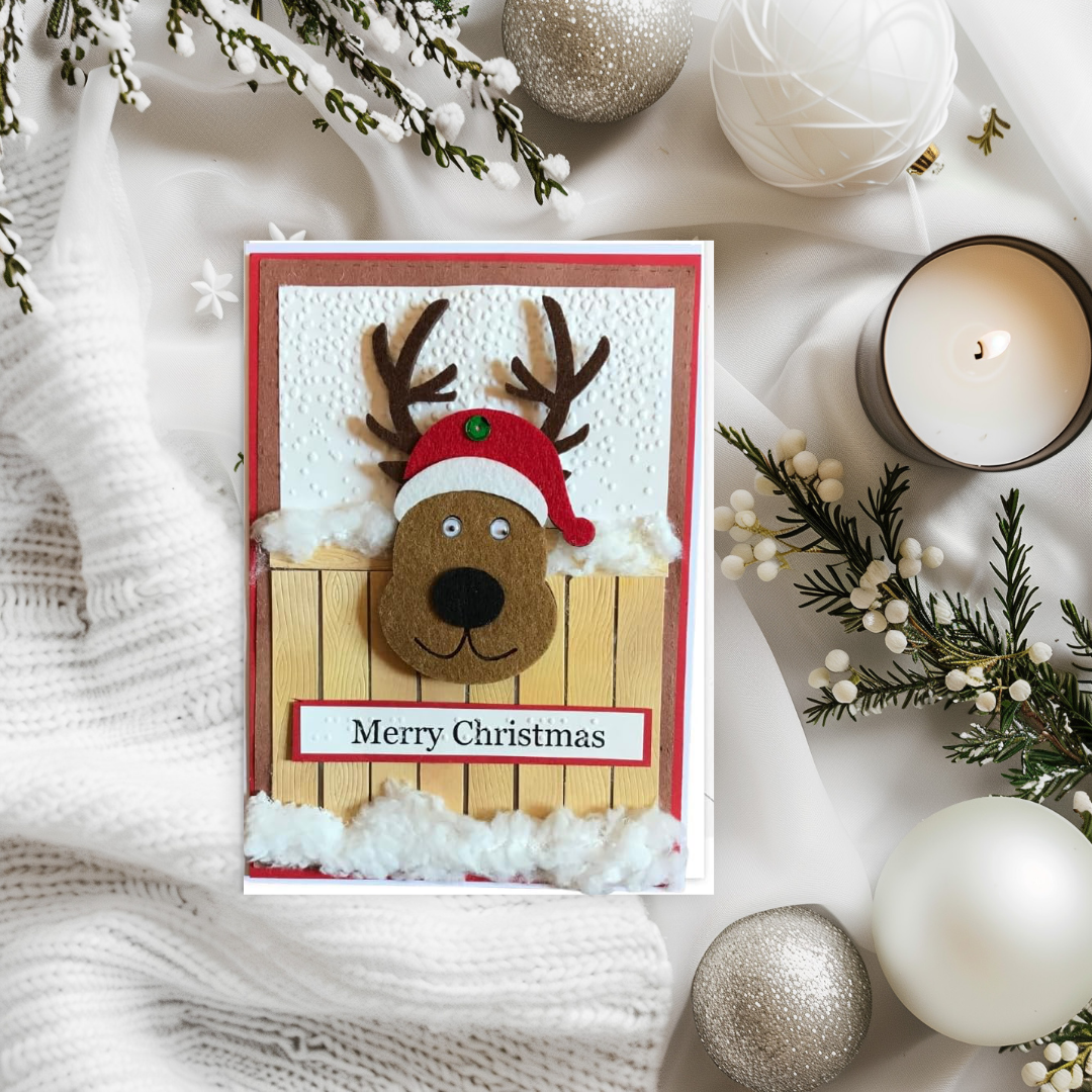 Braille Christmas Greeting Card – Festive Reindeer at Fence