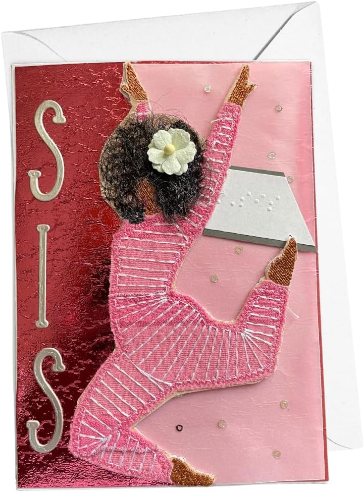 A handmade greeting card featuring a stylized dancer in a pink outfit with brown hair and a white flower, alongside the letters 'SIS' in metallic silver on a textured red background, with a pink background and white envelope.