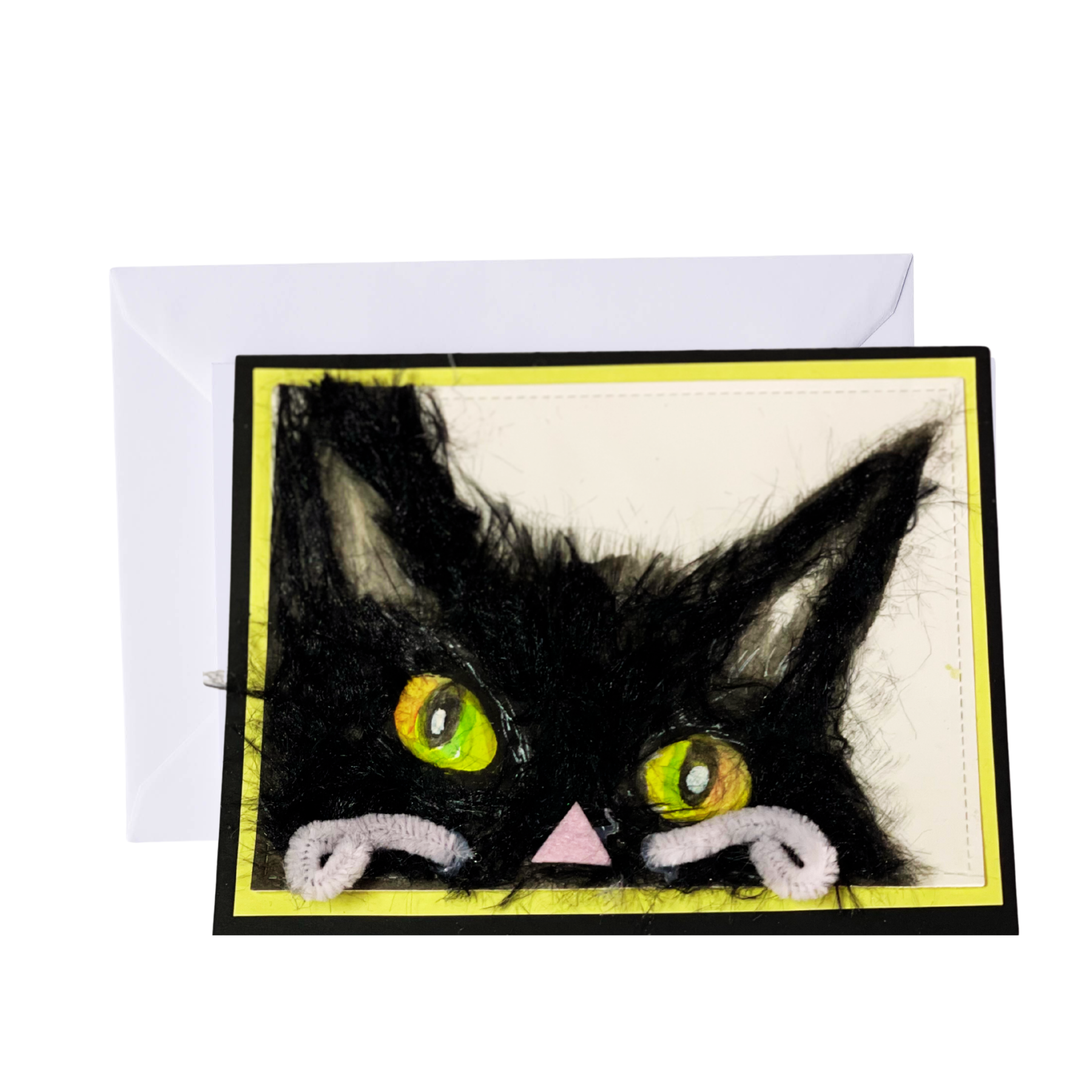 A handmade Halloween greeting card featuring a black cat made from black yarn and white pipe cleaners, with a 'Happy Halloween' label