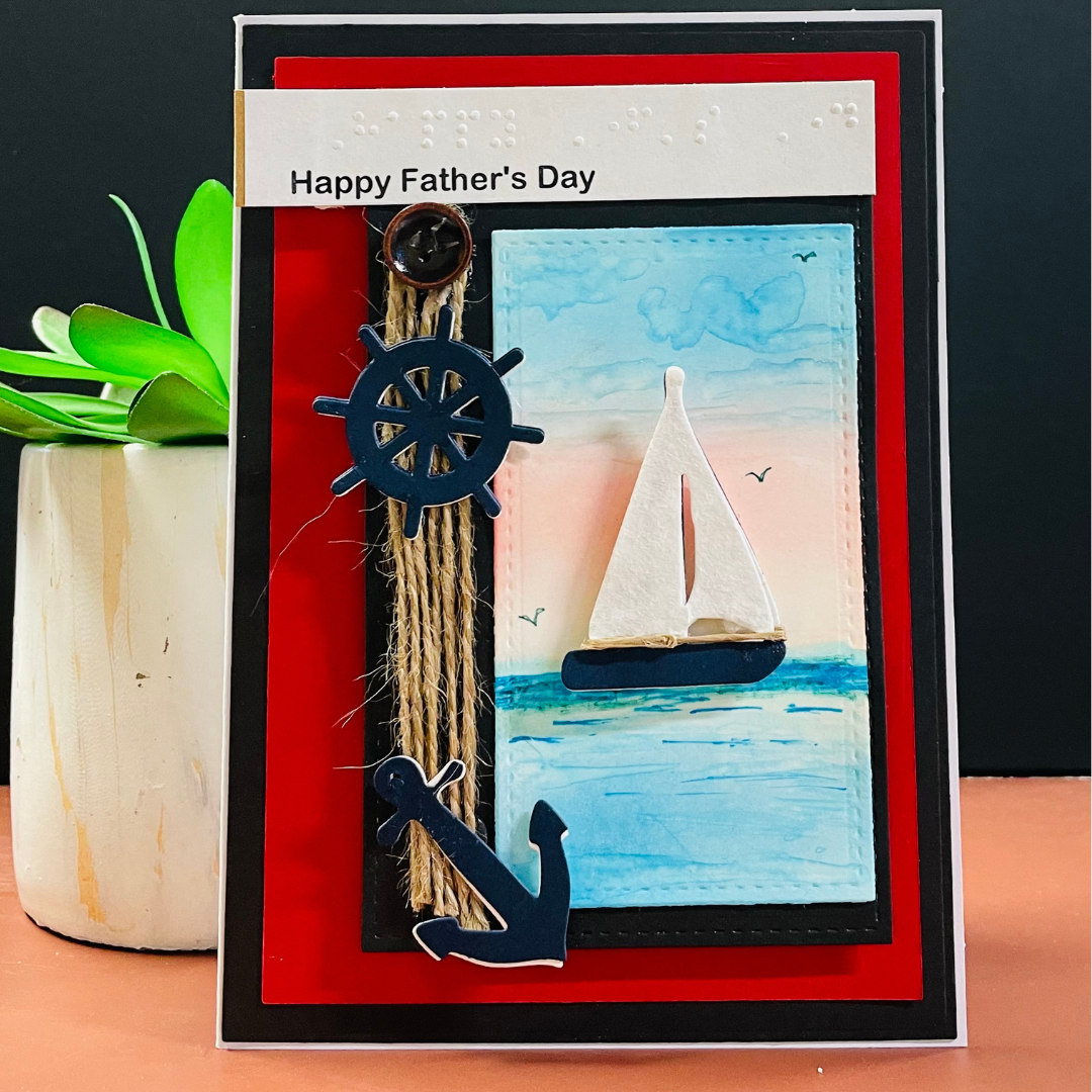 Father's Day card with sailboat and nautical elements on a red border