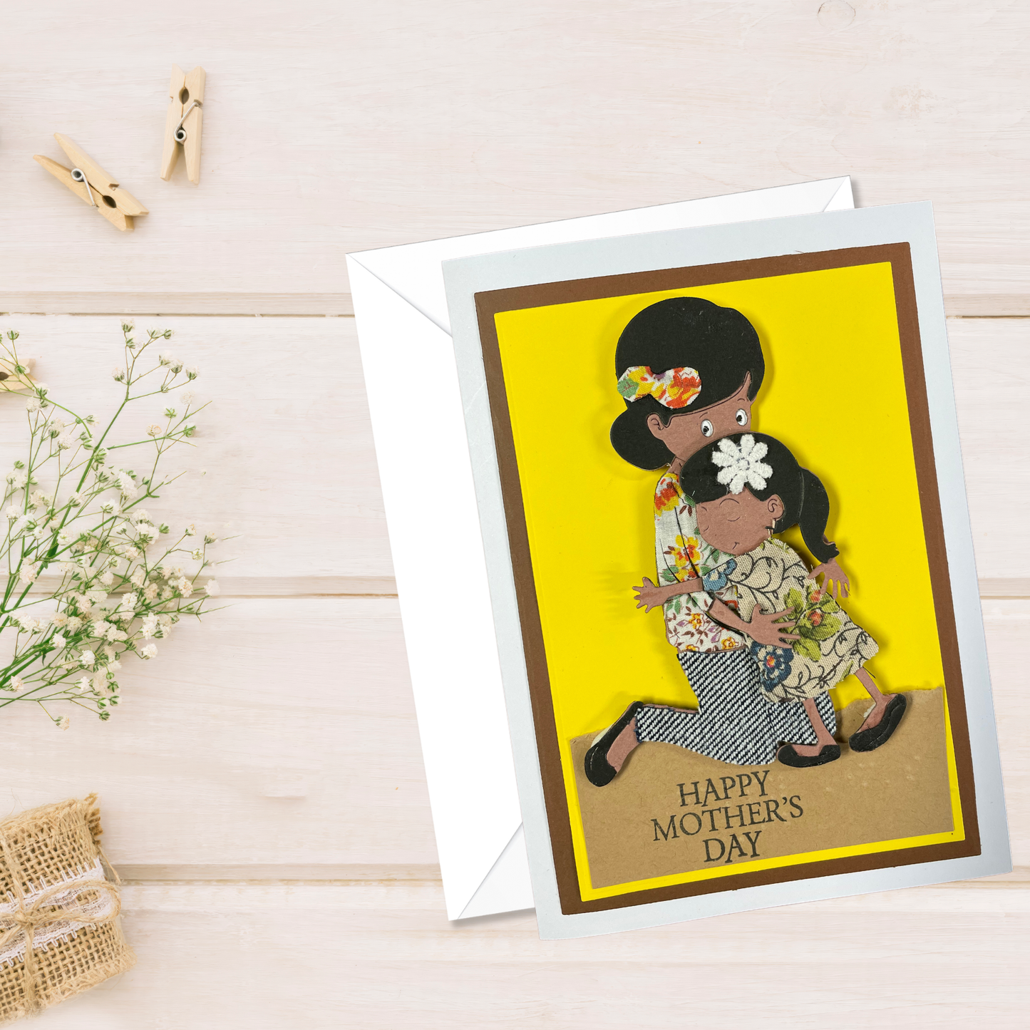 Mother's Day card with a tactile image of a woman on a yellow background, featuring the text 'Happy Mother's Day'.