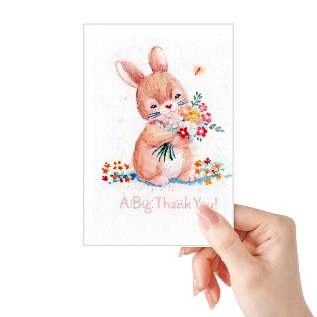 Card with a rabbit holding flowers and 'A Big Thank You!' text, held by a hand.