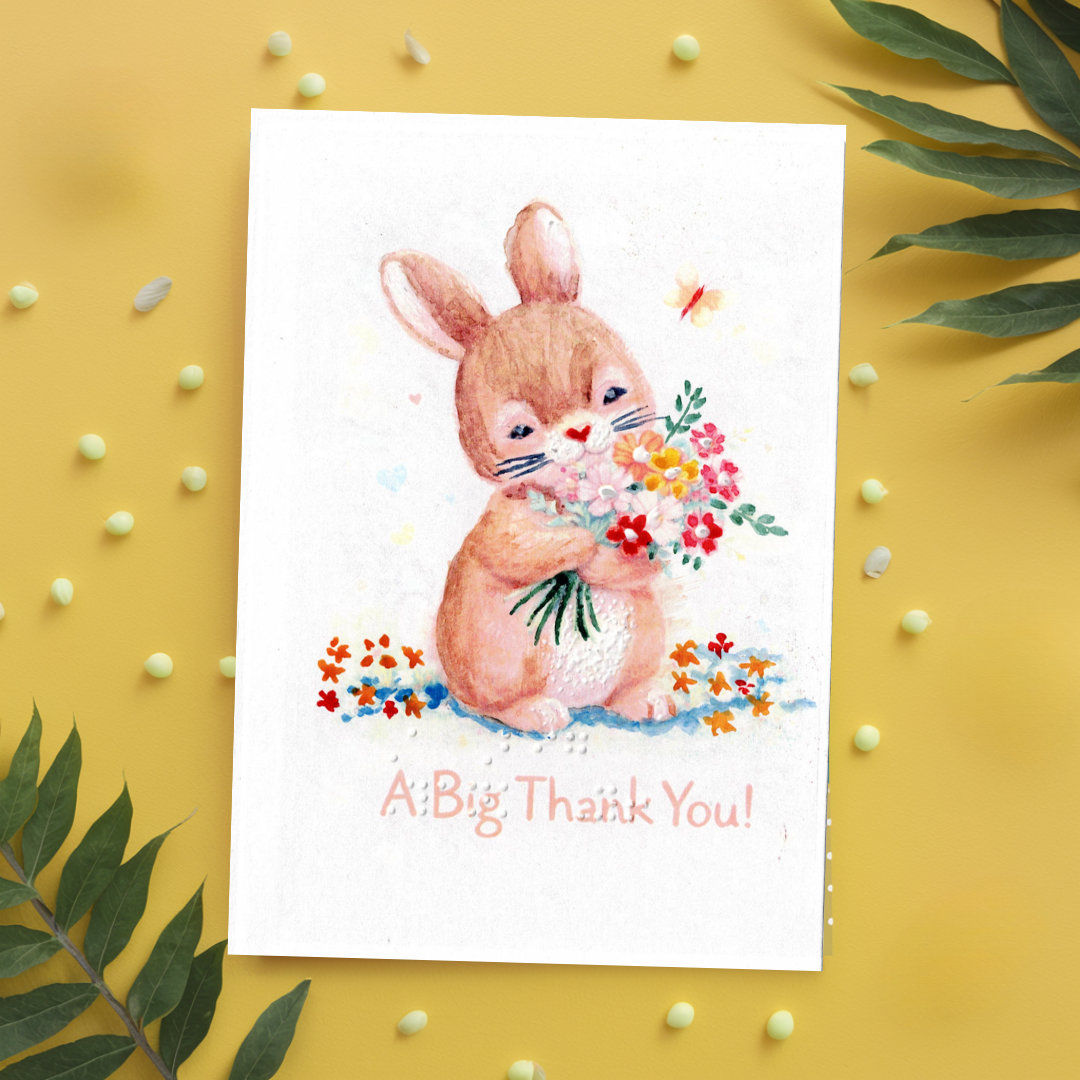Card with a rabbit holding flowers and 'A Big Thank You!' text on a yellow background with decorative elements.