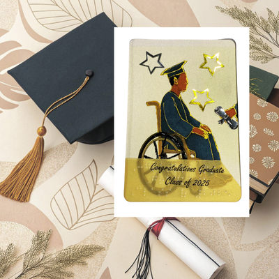 A graduation card with a watercolor illustration of a person in a wheelchair holding a diploma, surrounded by graduation symbols like a cap and stars. The card has the text 'Congratulations Graduate - Class of 2025' and is adorned with gold tactile outlines.