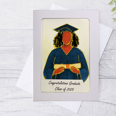 Graduation-themed card with a person in a blue gown and cap, holding a diploma, on a white background.