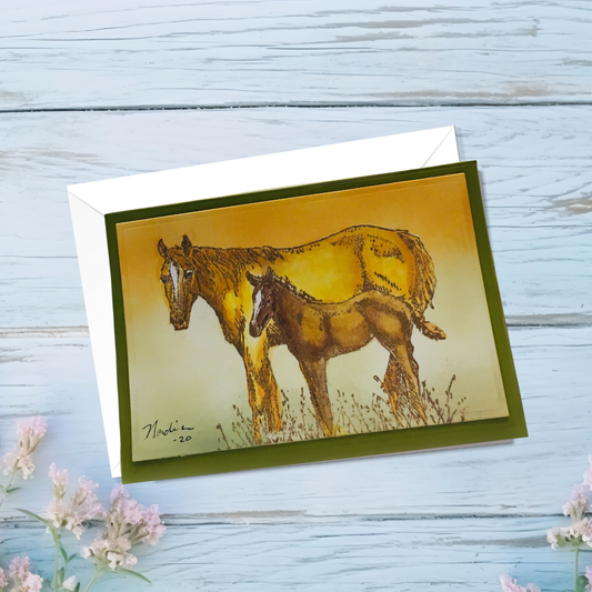 Card with a horse illustration on a wooden surface with flowers.