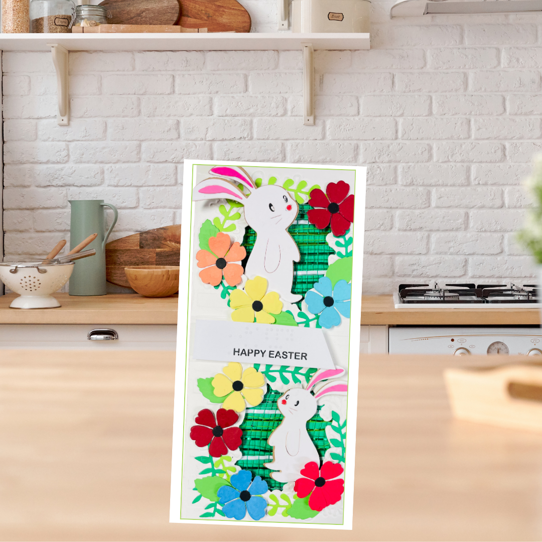Decorative Easter greeting card with bunnies and flowers on a kitchen counter.