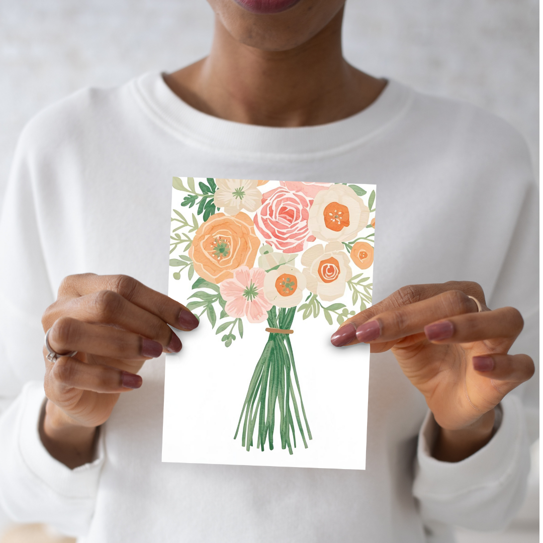 Person holding a card with a floral design