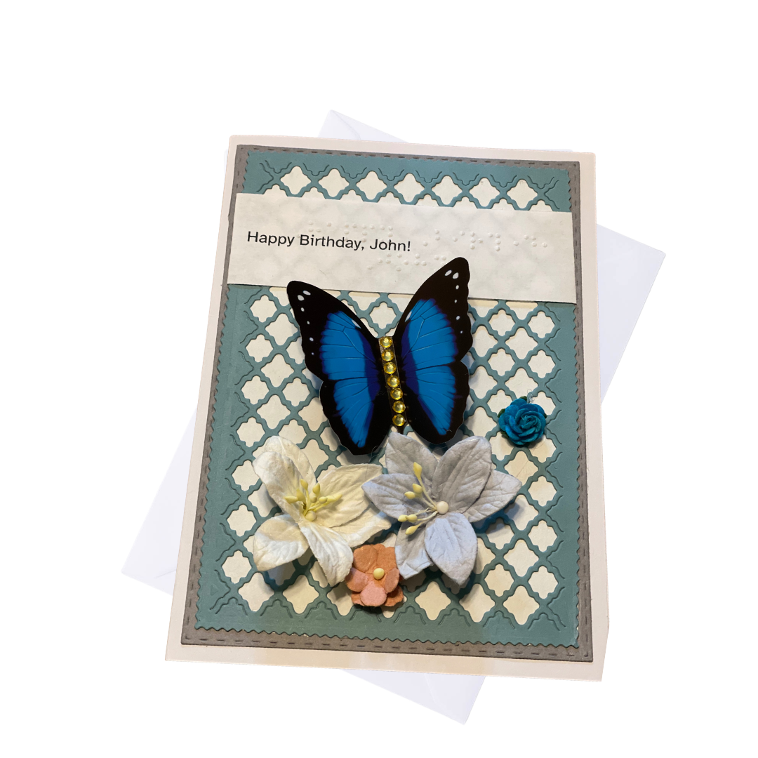 Greeting card with a blue butterfly and flowers on a decorative background