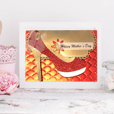 Greeting card with red high-heeled shoe design and 'Happy Mother's Day' text on a white background.