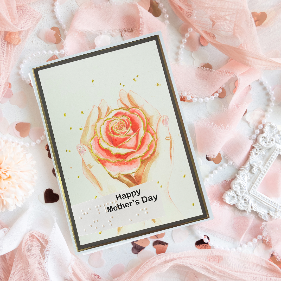 Greeting card with a rose illustration and 'Happy Mother's Day' text on a decorative background.